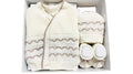 Set neonato maglioncino con calzini e cappellino in misto lana